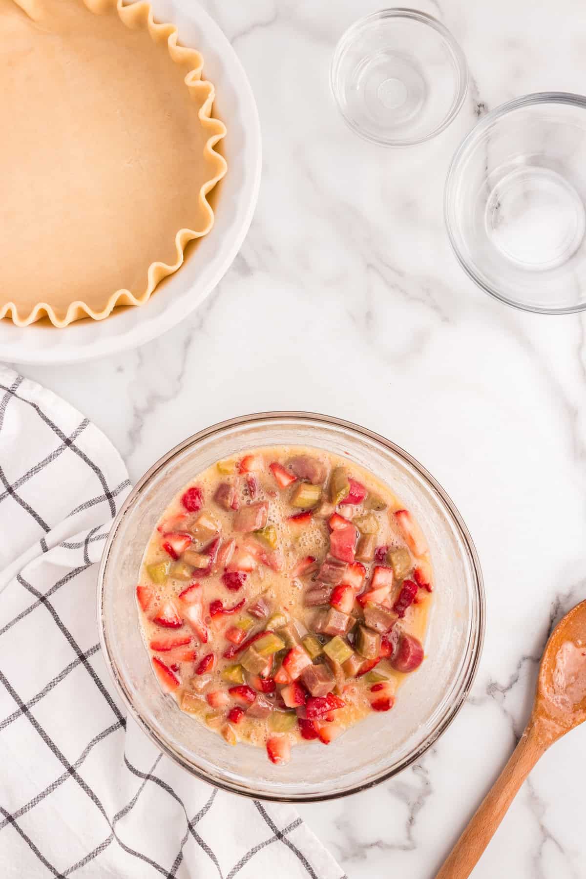 Combined Strawberry Rhubarb Pie filling in mixing bowl