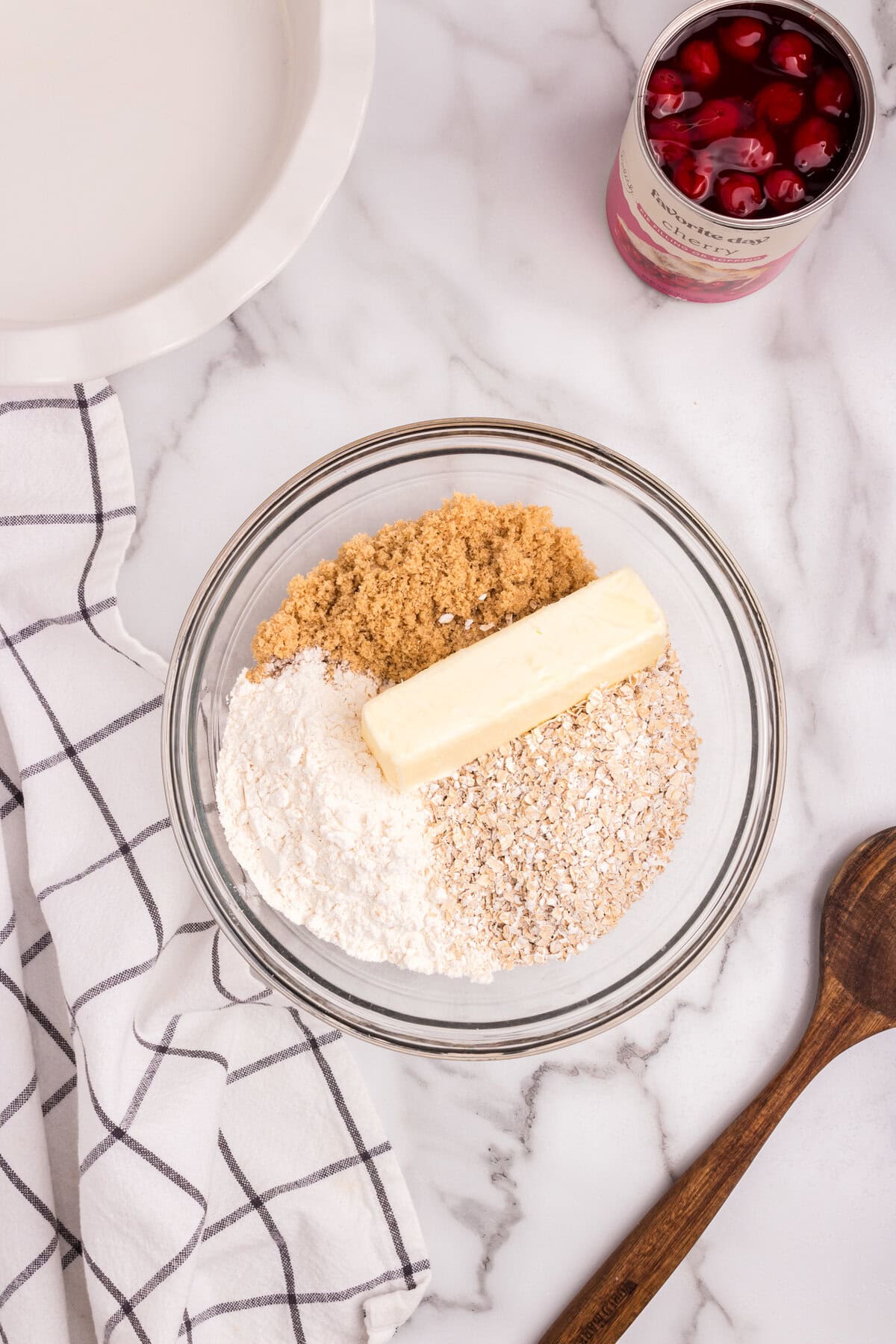 The ingredients combined into a crumbly mixture, ready to be used for crust or topping.