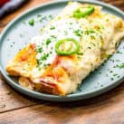 Two Shrimp Enchiladas on a blue plate