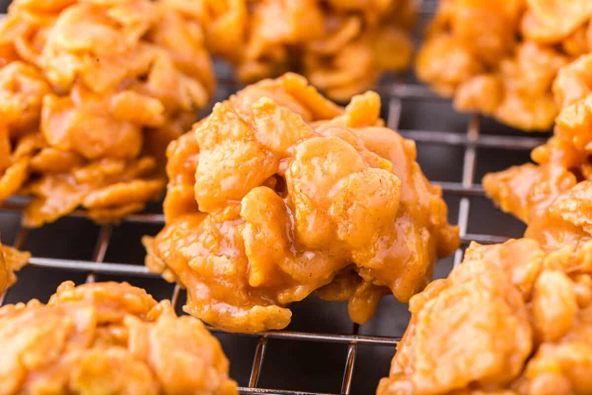 Close up photo of Cornflake Cookies on a cooling rack.