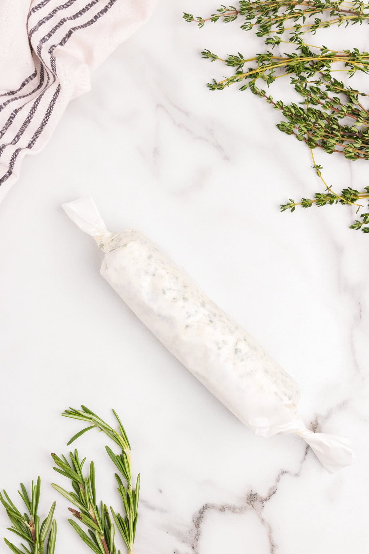 Herb Butter rolled in parchment paper.